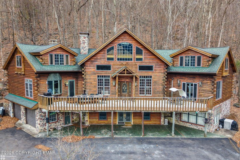 Welcome to this stunning 4-bedroom, 3.5-bath log home perfectly - photo 2