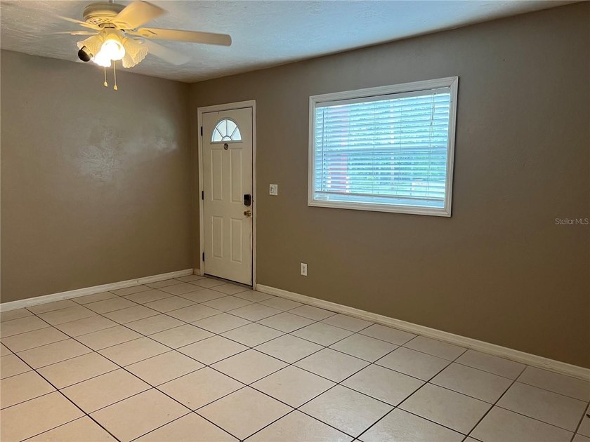 Welcome home to this charming 4-bedroom, 2-bath concrete block - photo 5