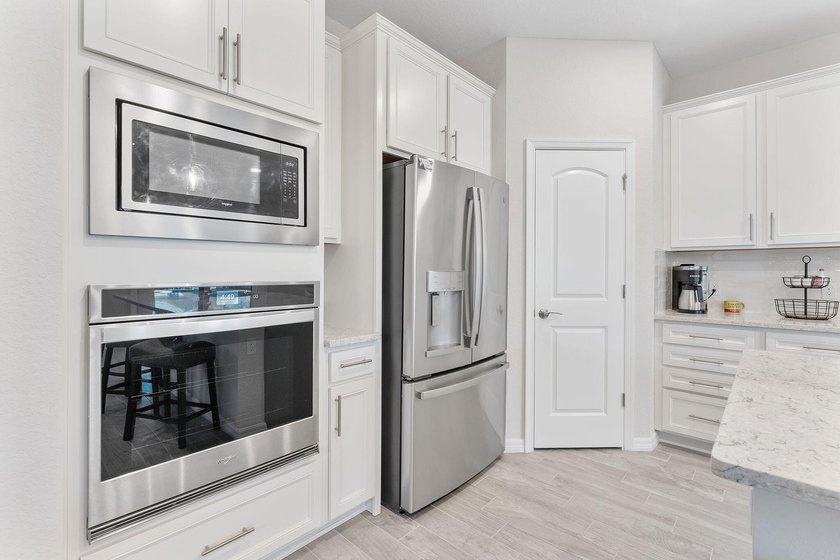 Introducing a stunning residence in the gated community of The - photo 5