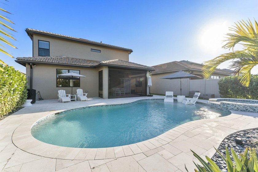 Introducing a stunning residence in the gated community of The - photo 6