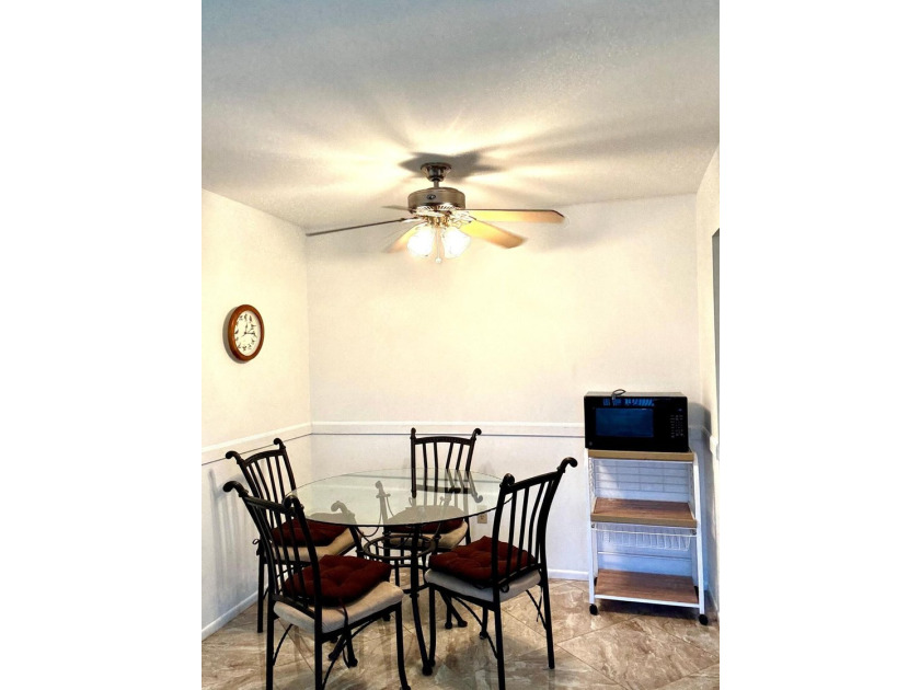 SPACIOUS, VACANT CORNER UNIT IN A DESIRABLE 55+ COMMUNITY. JUST - photo 12