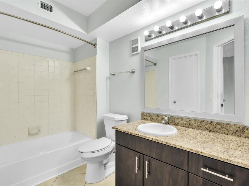 Location, location, location! This spacious and bright - photo 17