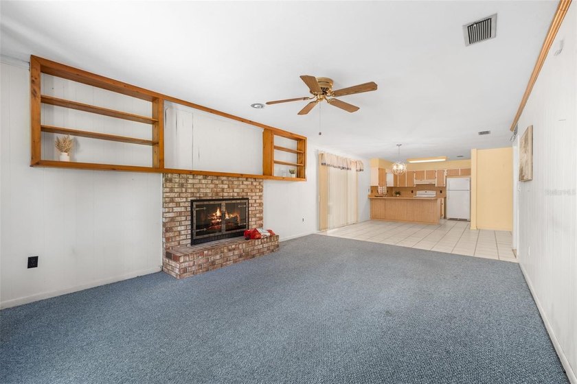 Welcome to your new home! Nestled on a spacious half-acre lot in - photo 4