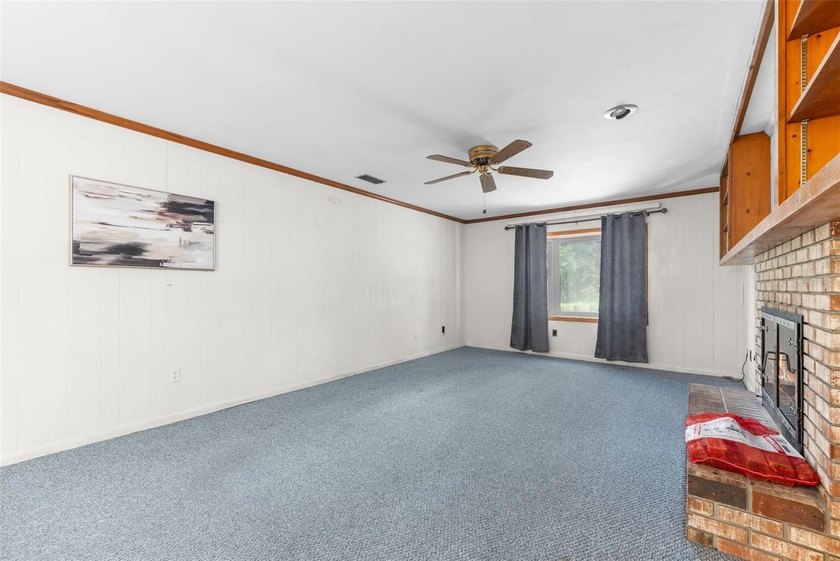 Welcome to your new home! Nestled on a spacious half-acre lot in - photo 6