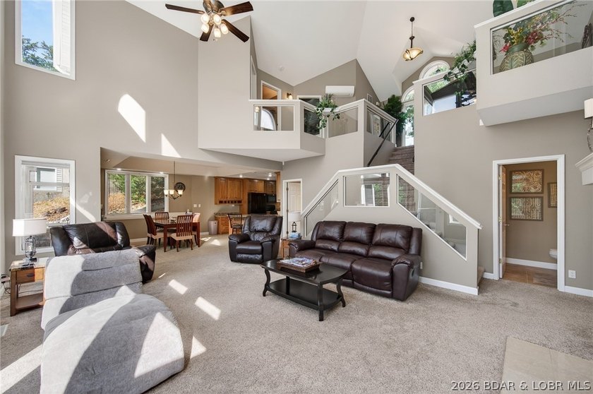 This 5-bedroom, 3.5-bath lakefront home in Four Seasons is - photo 12