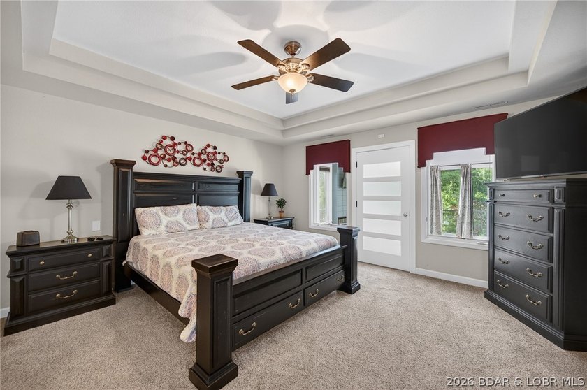 This 5-bedroom, 3.5-bath lakefront home in Four Seasons is - photo 25