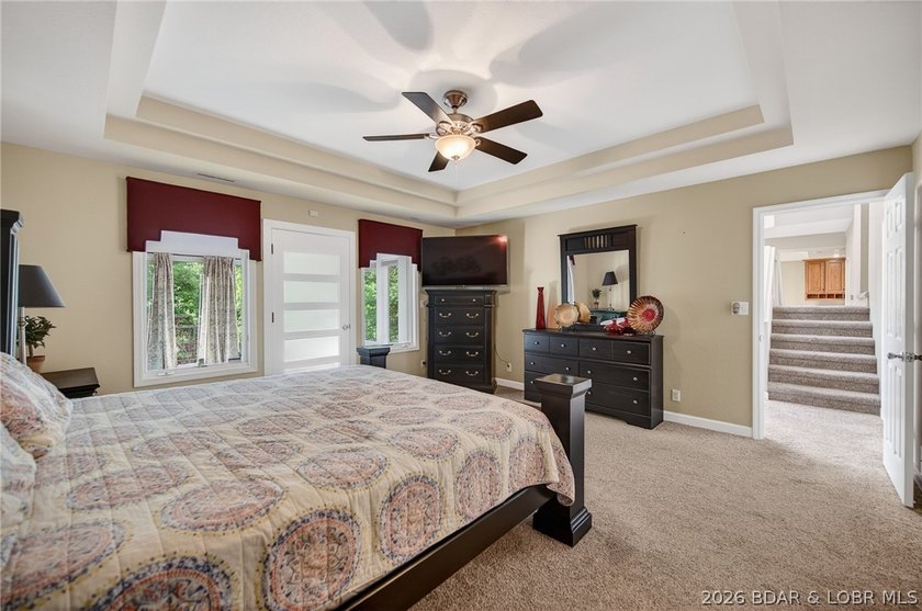 This 5-bedroom, 3.5-bath lakefront home in Four Seasons is - photo 26