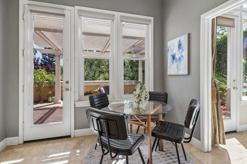 Rarely available, this townhouse-style condo is inside the - photo 14