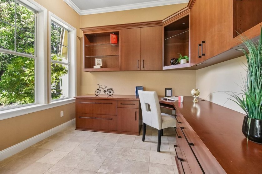 Rarely available, this townhouse-style condo is inside the - photo 20
