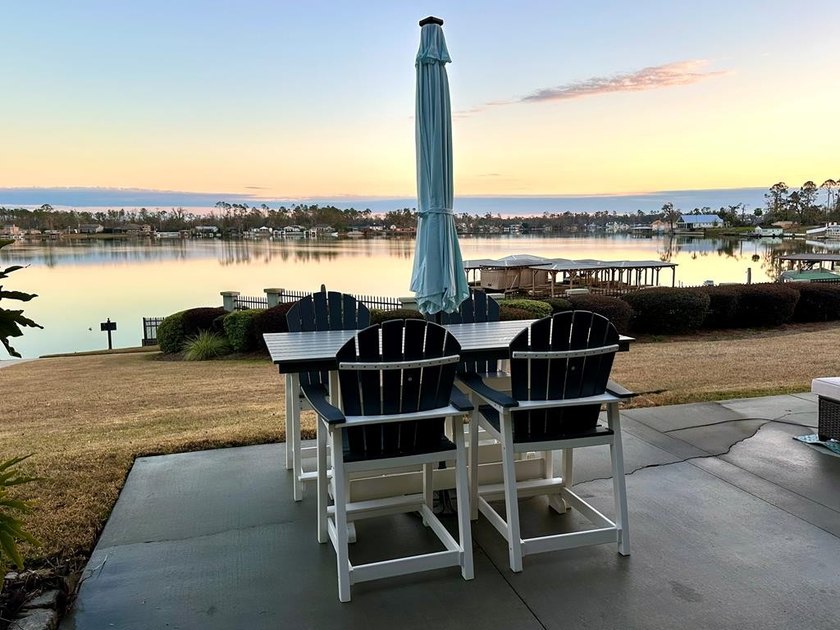 Wake up to peaceful lake views in this Beautifully Maintained - photo 20