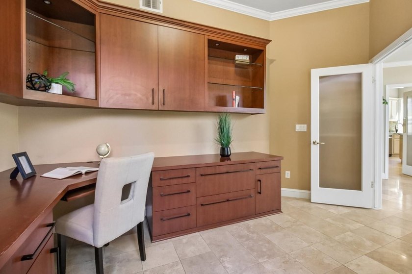 Rarely available, this townhouse-style condo is inside the - photo 21
