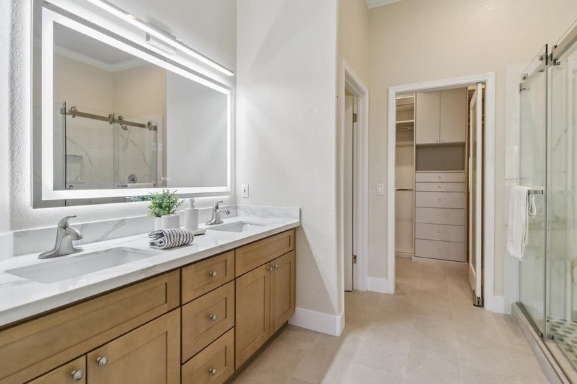 Rarely available, this townhouse-style condo is inside the - photo 29