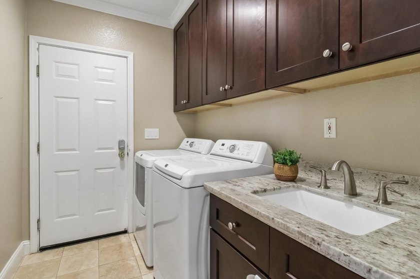 Rarely available, this townhouse-style condo is inside the - photo 37