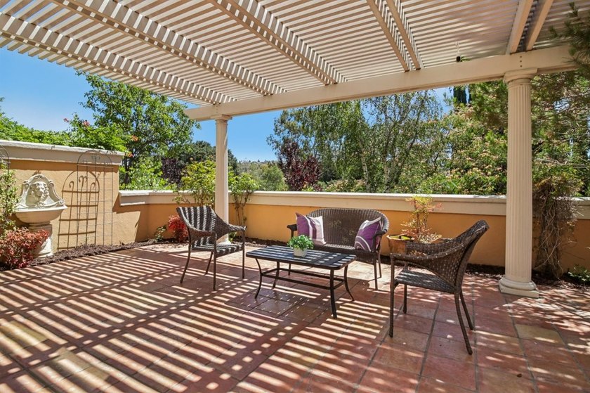 Rarely available, this townhouse-style condo is inside the - photo 38
