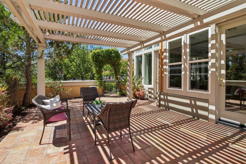 Rarely available, this townhouse-style condo is inside the - photo 39