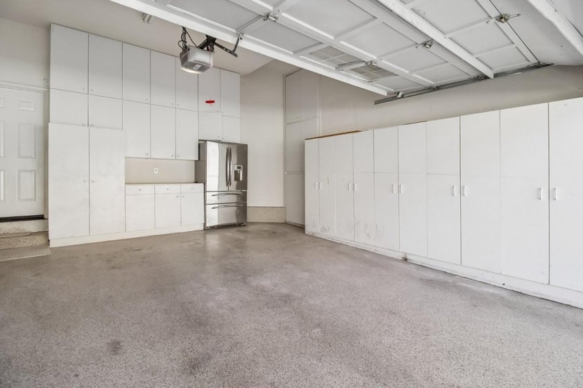 Rarely available, this townhouse-style condo is inside the - photo 41