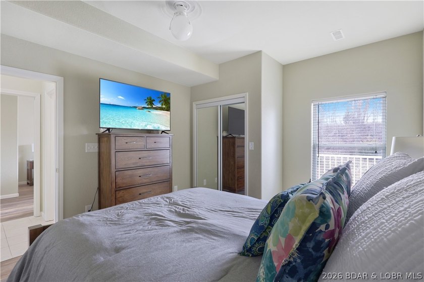 Welcome to Monarch Cove, where this fully furnished, top-floor - photo 12