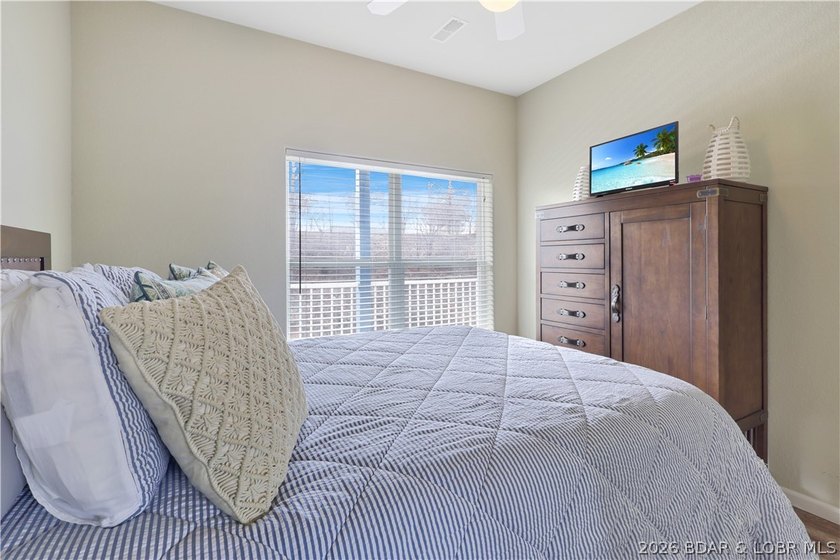 Welcome to Monarch Cove, where this fully furnished, top-floor - photo 15