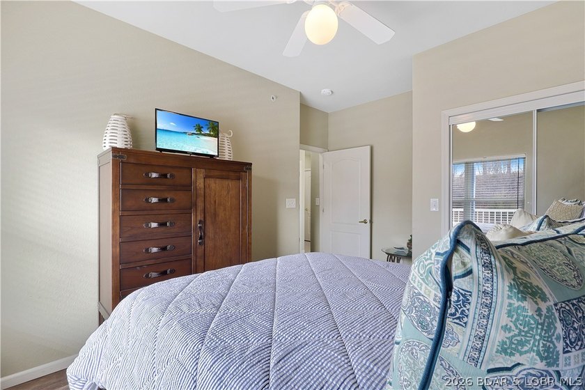 Welcome to Monarch Cove, where this fully furnished, top-floor - photo 17