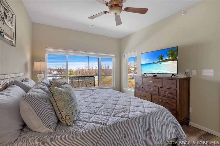 Welcome to Monarch Cove, where this fully furnished, top-floor - photo 20
