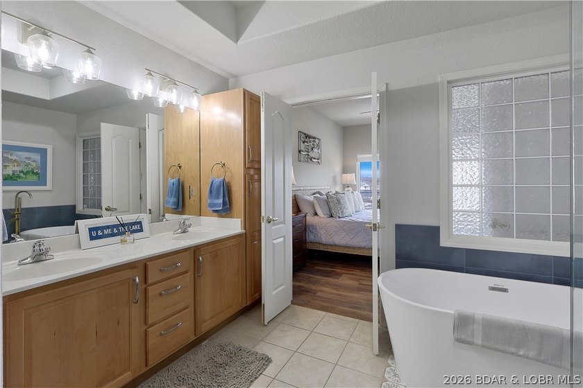 Welcome to Monarch Cove, where this fully furnished, top-floor - photo 21