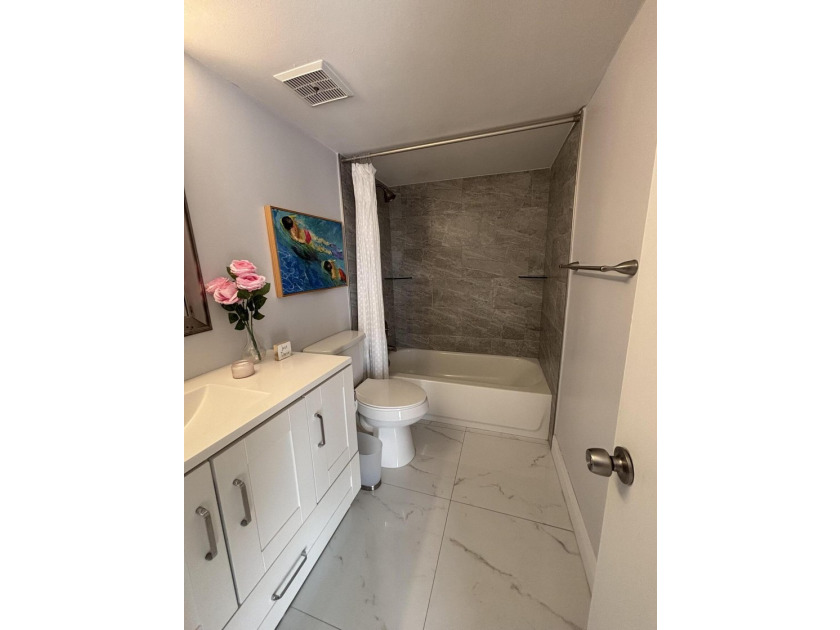 Move right in to this charming THREE bedroom condominium, in the - photo 11