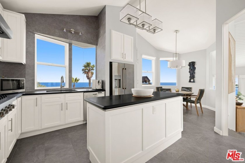 Perched above one of Orange County's most coveted stretches of - photo 15