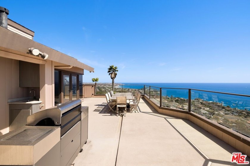 Perched above one of Orange County's most coveted stretches of - photo 21