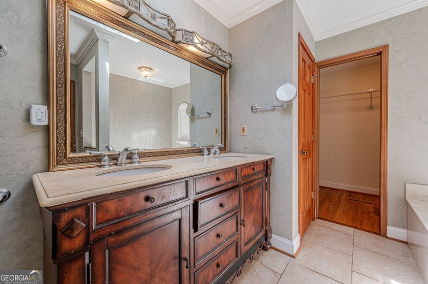 Welcome to 137 Broadwater Court in the highly sought-after gated - photo 32