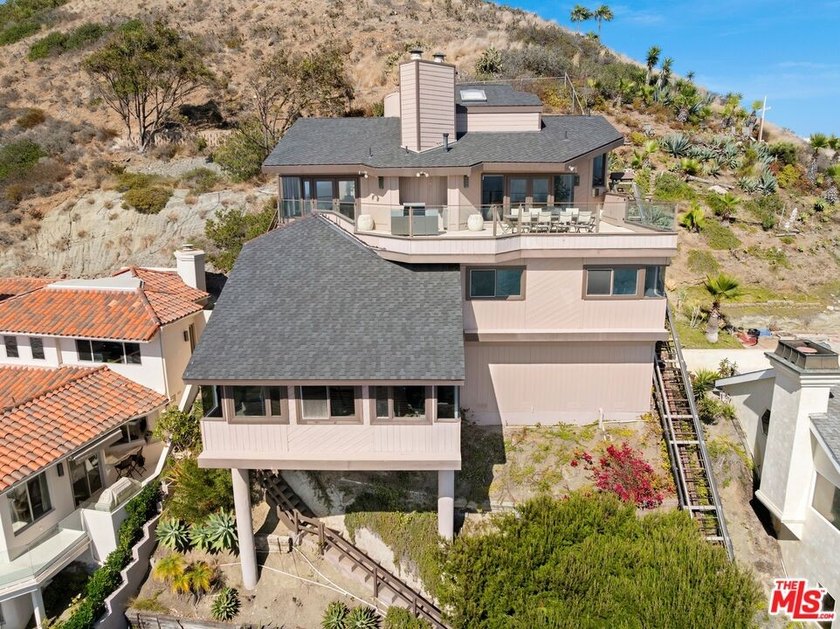 Perched above one of Orange County's most coveted stretches of - photo 41
