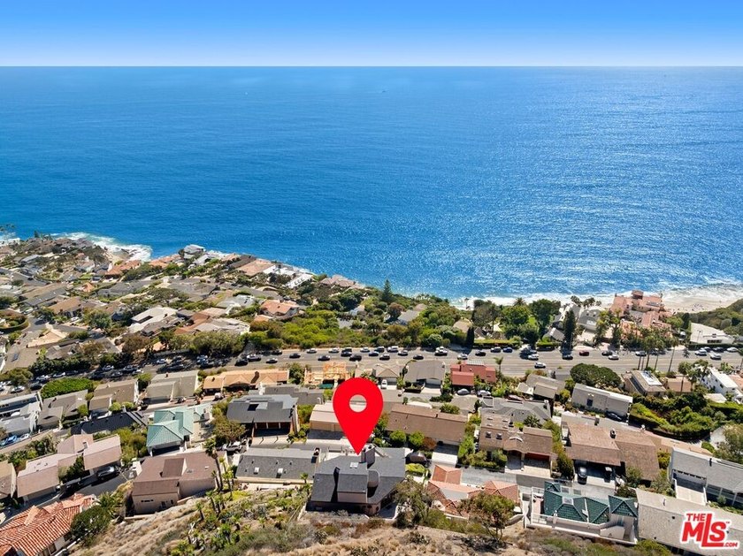 Perched above one of Orange County's most coveted stretches of - photo 43