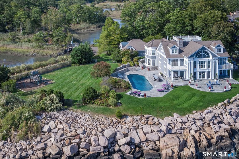 This magical light-filled New England 7,945 s.f. *cottage* takes - photo 3