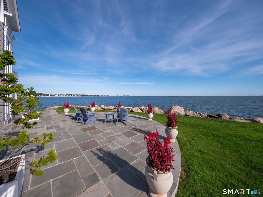 This magical light-filled New England 7,945 s.f. *cottage* takes - photo 8