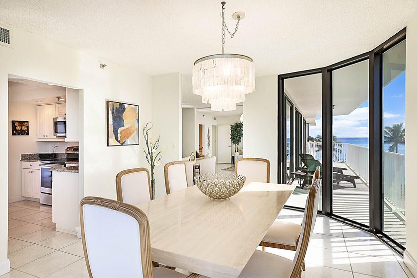 Experience the ultimate in oceanfront luxury with this rarely - photo 10