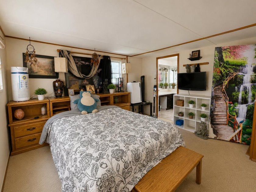 A spacious 2-bedroom, 2-bath mobile home located in the - photo 15