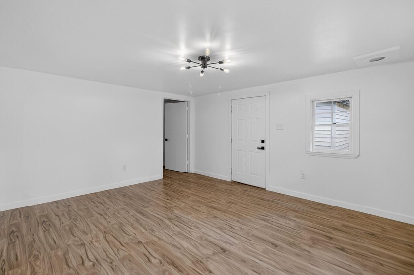 NEWLY REMODELED HOME WITH TWO GARAGES!Welcome to this charming - photo 15