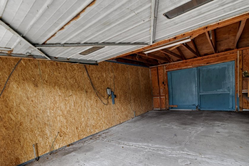 NEWLY REMODELED HOME WITH TWO GARAGES!Welcome to this charming - photo 29