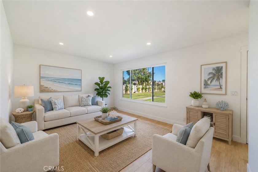 Welcome Home to this Beautifully Maintained Updated End-Unit - photo 6