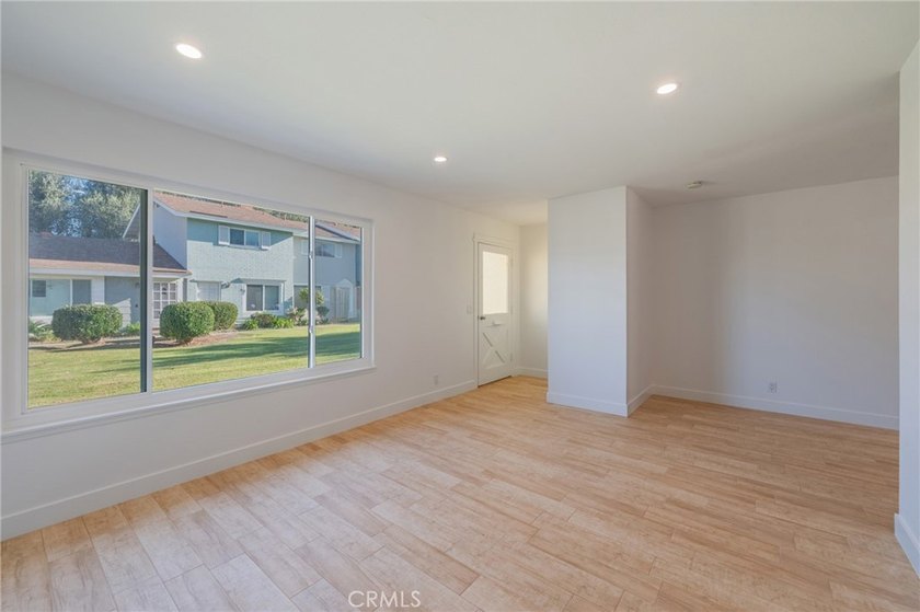 Welcome Home to this Beautifully Maintained Updated End-Unit - photo 8