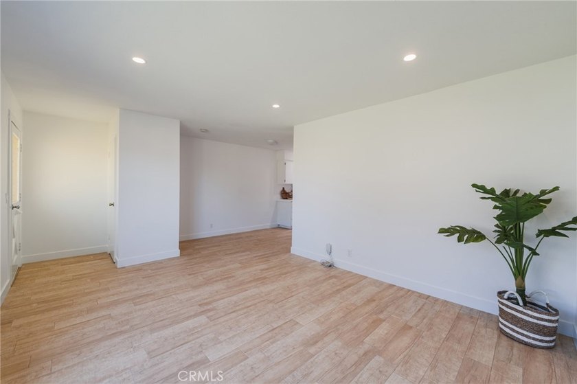 Welcome Home to this Beautifully Maintained Updated End-Unit - photo 10