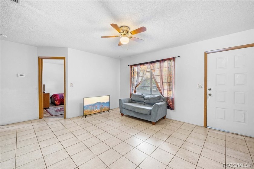 25,000 price reduction! Charming and versatile, this 2-bedroom - photo 11