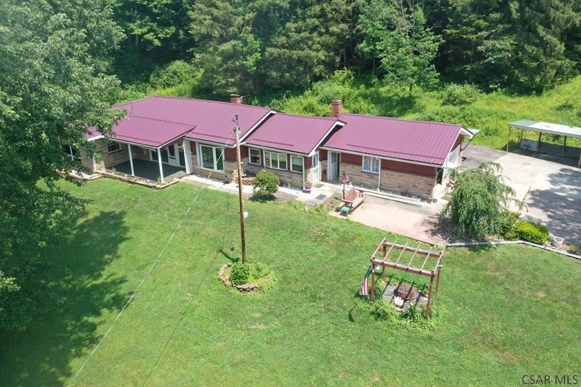 Nestled on 5.6 beautiful wooded acres in scenic Lower Turkeyfoot - photo 3