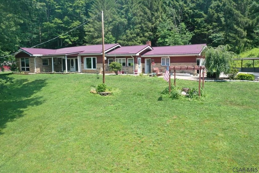 Nestled on 5.6 beautiful wooded acres in scenic Lower Turkeyfoot - photo 4