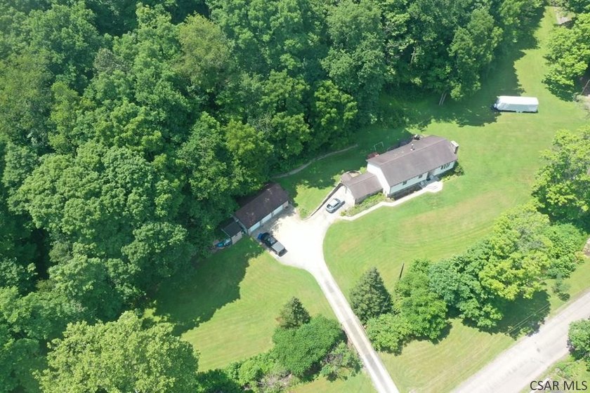 Nestled on 5.6 beautiful wooded acres in scenic Lower Turkeyfoot - photo 7