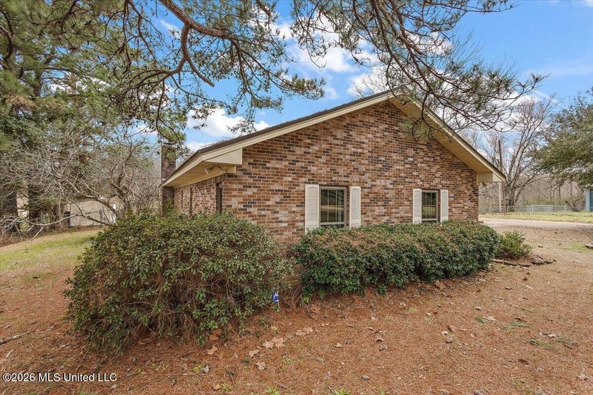 Nestled in the serene countryside of Terry, this 7.6-acre - photo 2