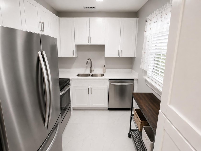 Welcome home to this charming one-bedroom, one-and-a-half-bath - photo 2