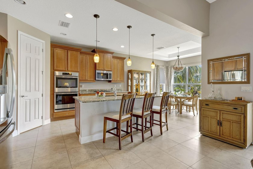 This beautiful home features four bedrooms, three bathrooms, and - photo 11