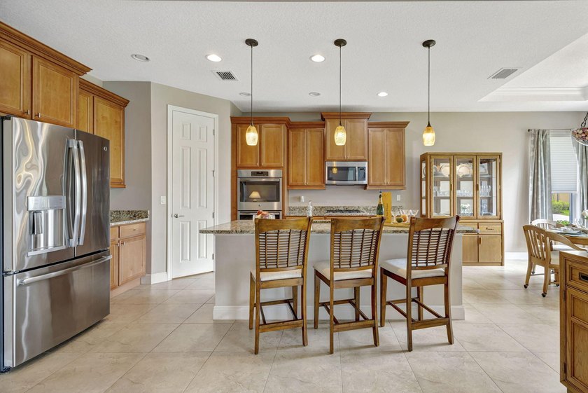 This beautiful home features four bedrooms, three bathrooms, and - photo 12