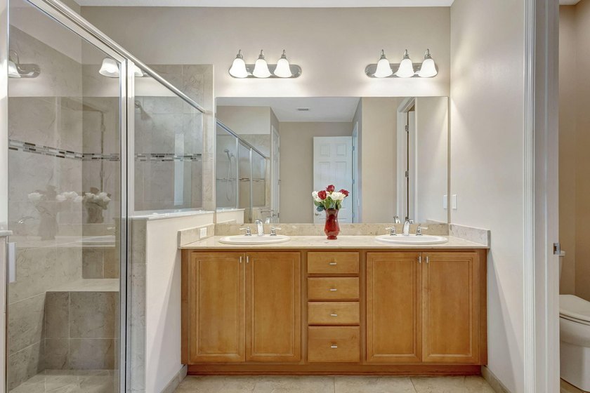 This beautiful home features four bedrooms, three bathrooms, and - photo 25