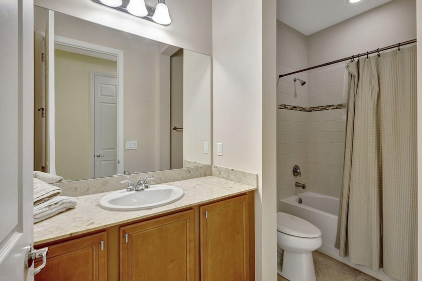 This beautiful home features four bedrooms, three bathrooms, and - photo 29